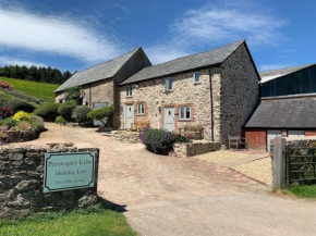 The Barn at Pentregaer Ucha, with tennis court and lake